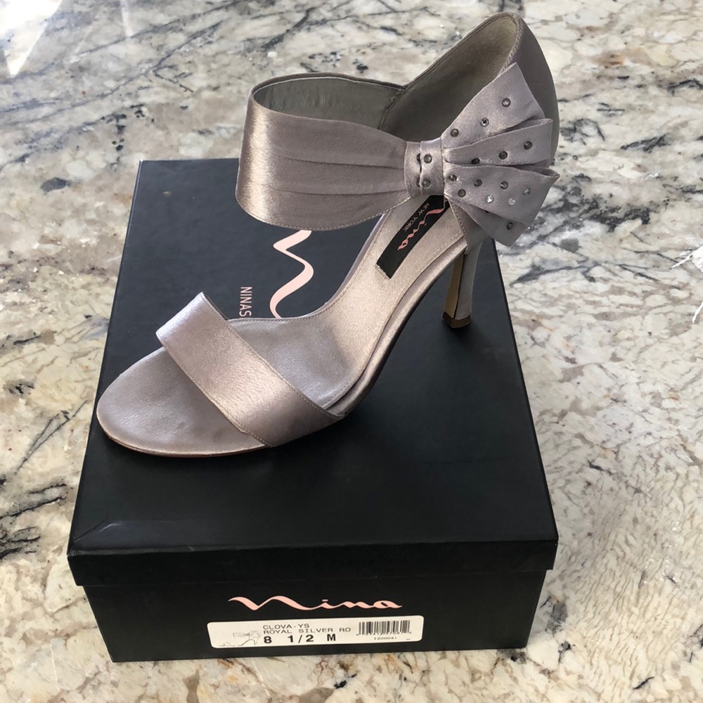 Nina silver bow heels.